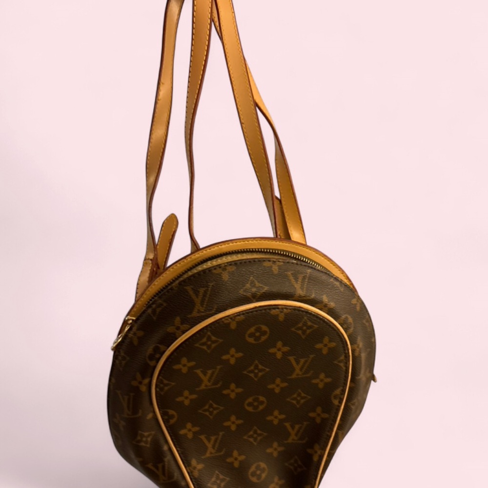 Monogram Round backpack in Brown and Tan
